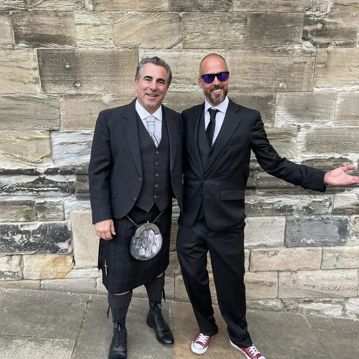 Skeenee at a formal event beside another guest.